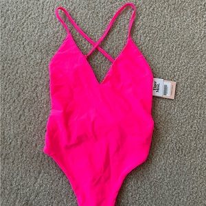 Brand new Tiger Mist pink bodysuit with open back